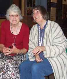 Magsie shows Judy Tarling how to play the spoons, Irish style